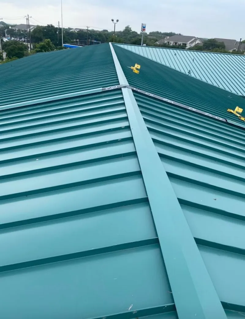 Green commercial metal roof ridge and valley for Metal Roof Repair in Lake Geneva