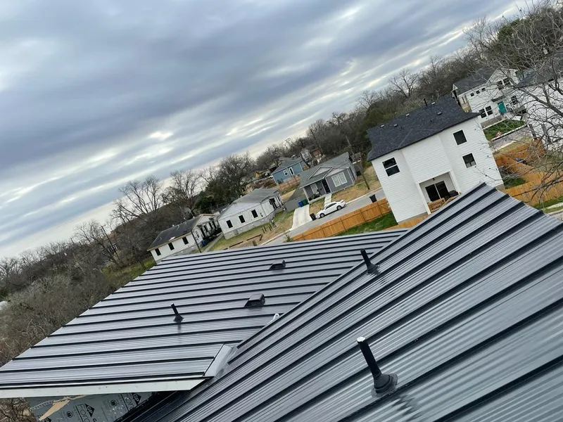 Standing seam metal roof panels with vents for Skylight Repair in Lake Geneva